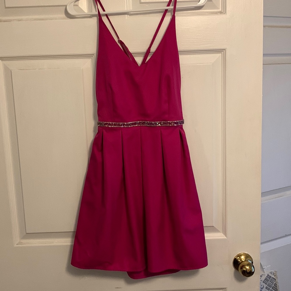 Absolutely stunning fuchsia short dress with a pink studded belt